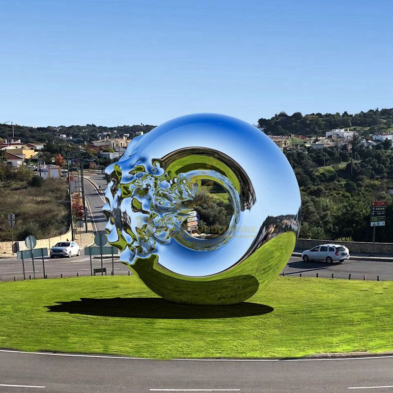 Designed by artist Ken Kelleher Stainless Steel Mirror Polished Abstract Sculpture