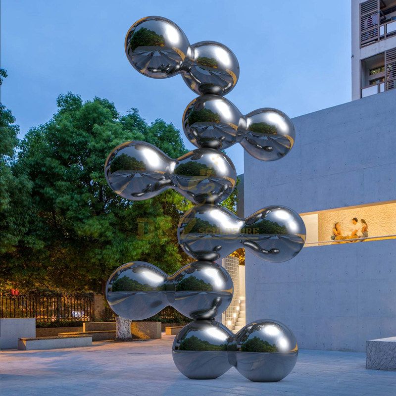 Designed by artist Ken Kelleher Mirror Polished Stainless Steel Sculpture