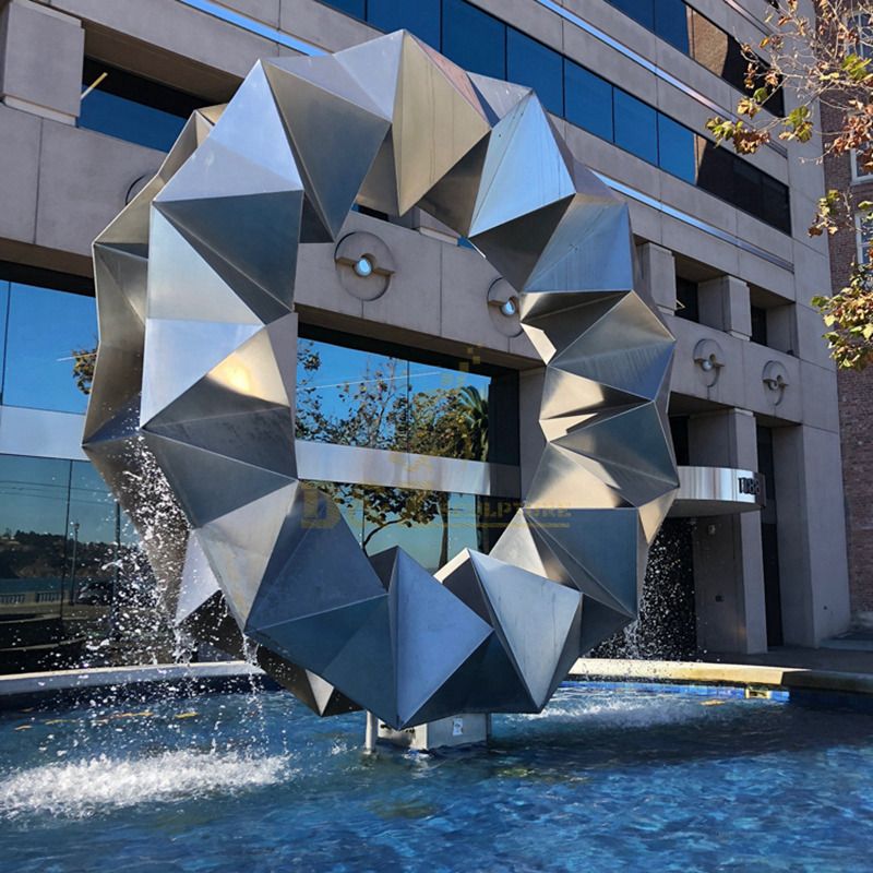 Large circular design geometric stainless steel fountain sculpture