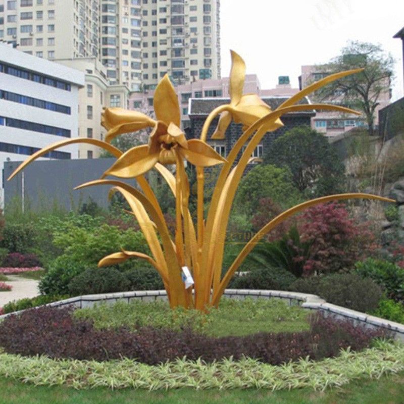 large outdoor abstract modern sculpture gold orchid sculpture
