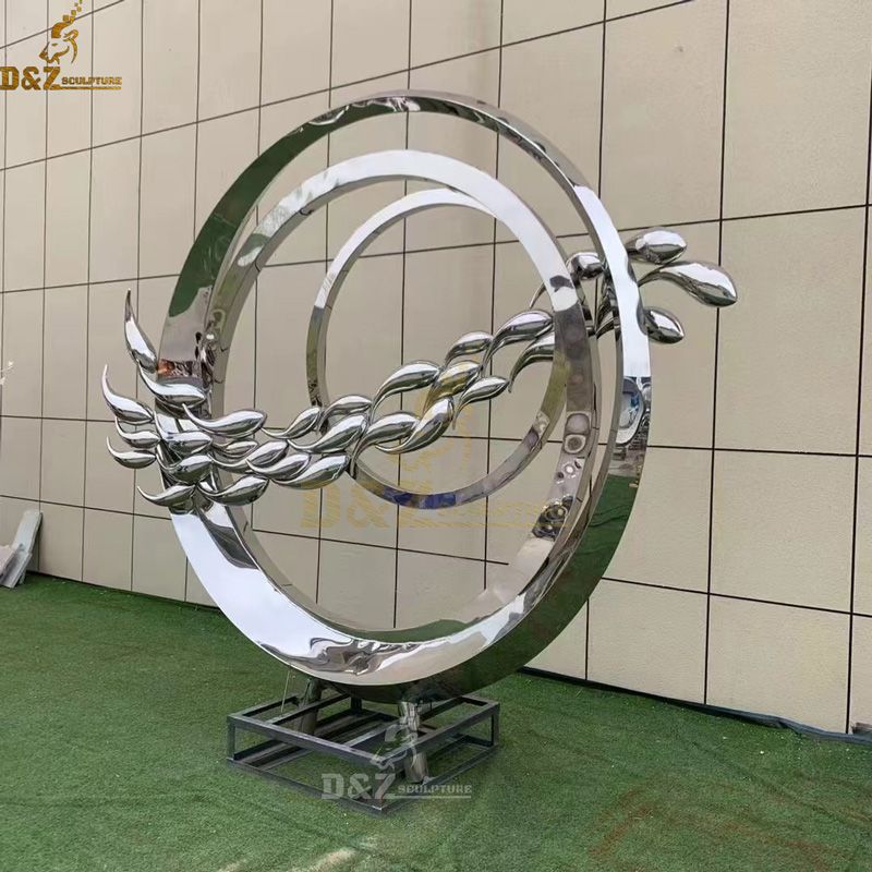metal circle with fishes sculpture