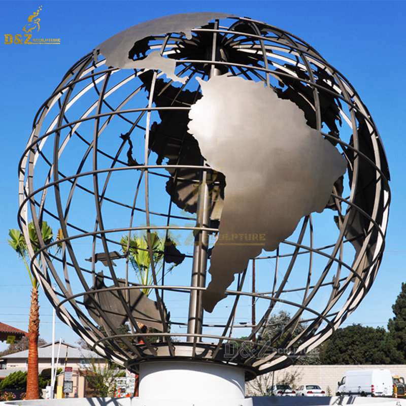 metal globe on hand sculpture