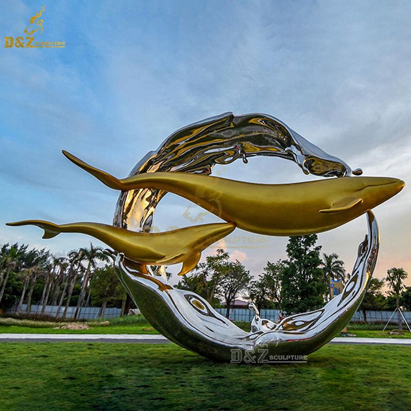 Large metal dolphin sculptures